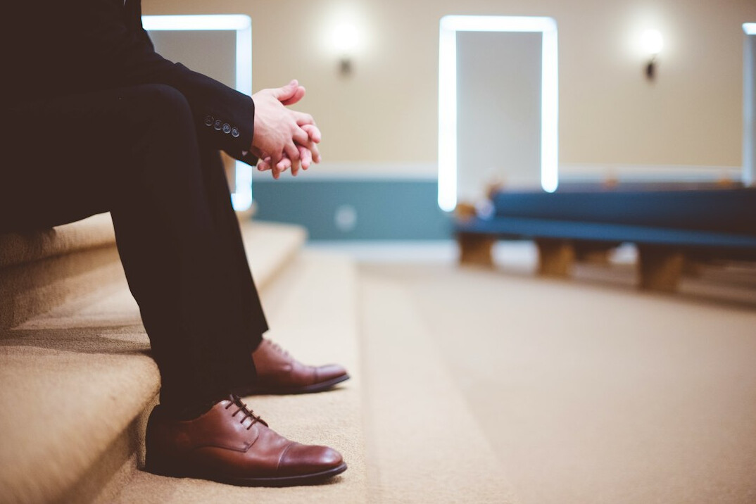 person reflecting on testimony